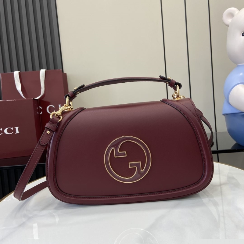 G*u*i top handle bags